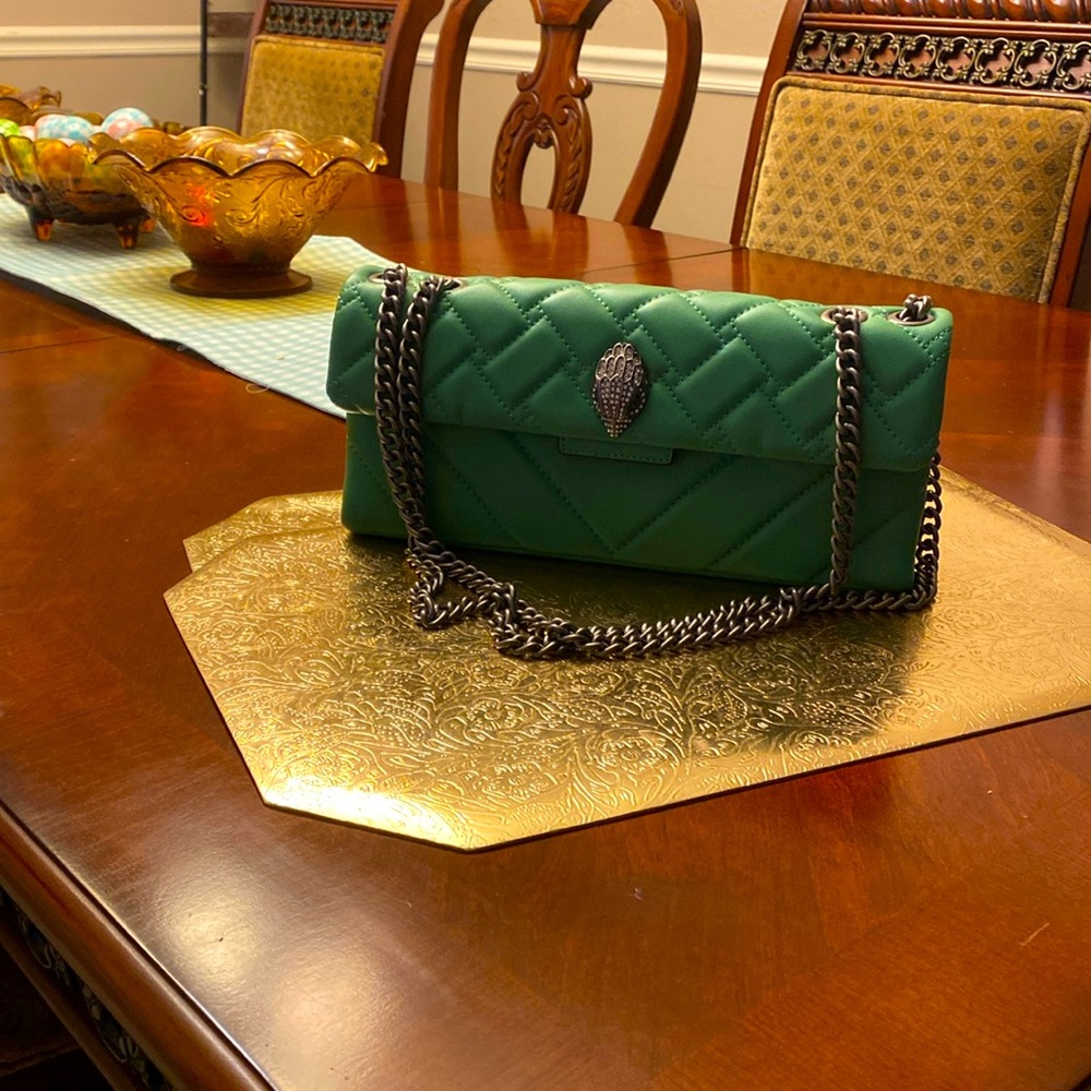 Kurt Gieger small green bag. Very clean. Non smoker. Used for a party once.